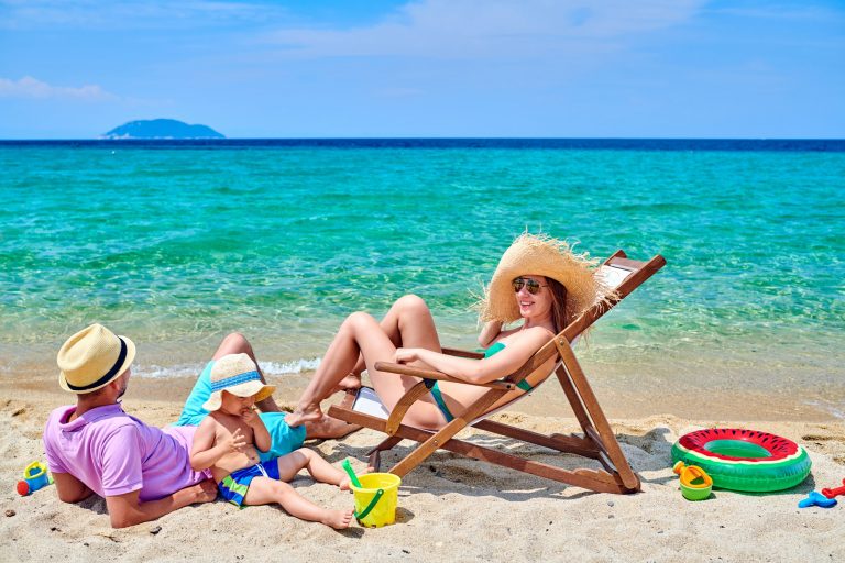 Family on beach in Greece